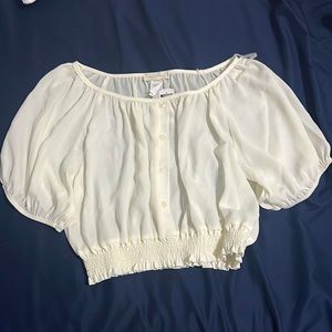 Cream color off the shoulder shirt
